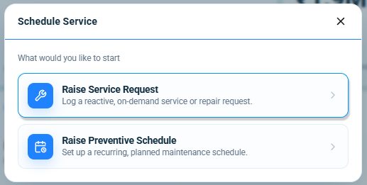 The Schedule Service dialogue in Onfinity offering two routes from an asset: raise a reactive, on-demand service or repair request, or set up a recurring planned maintenance schedule